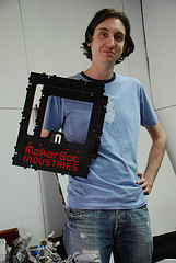 Jimmie Rodgers holding part of a MakerBot